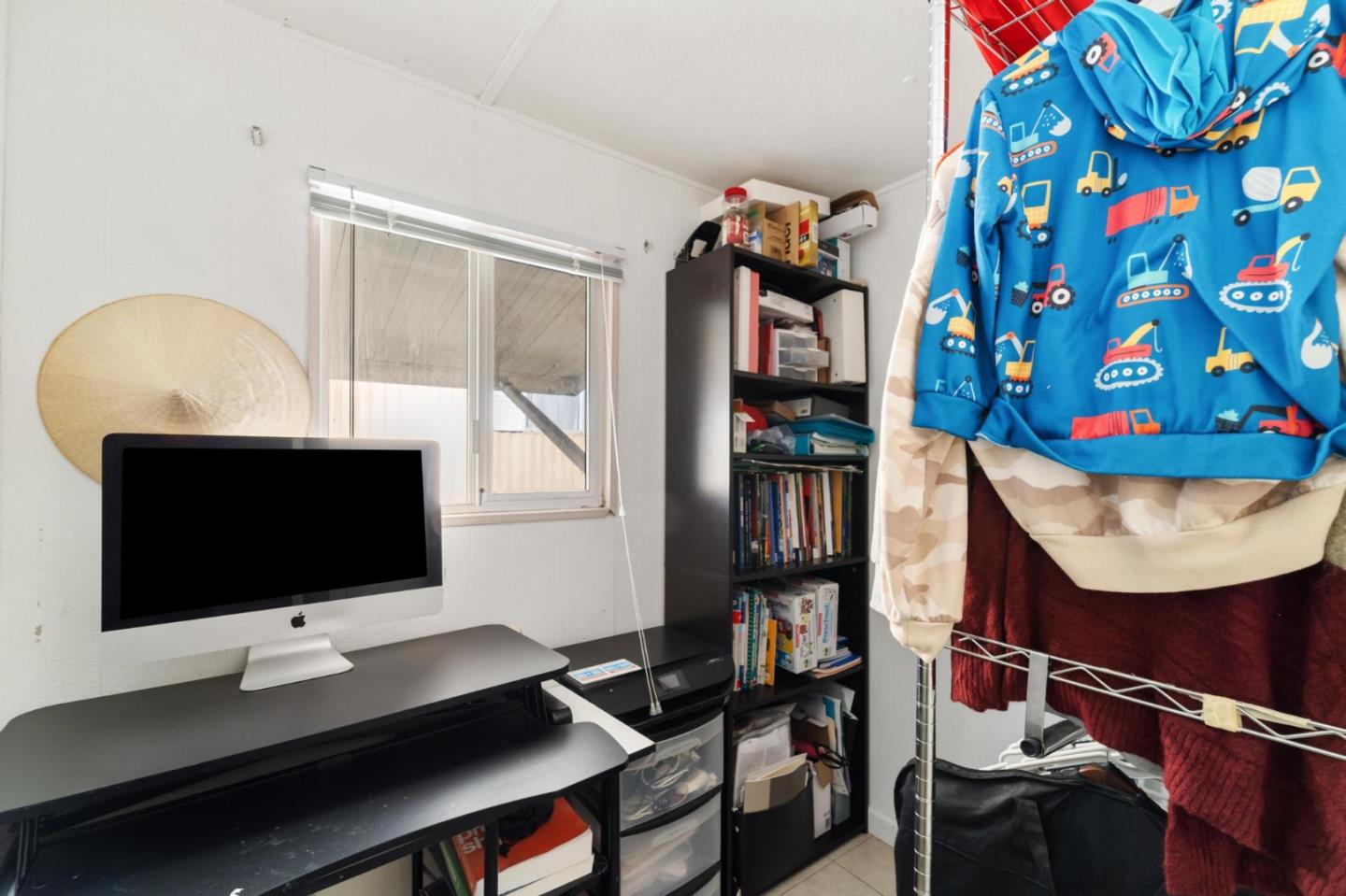 4320 Monterey Road, Unit 39 San Jose, CA 95111 - Photo 9 of 17 a desktop computer sitting on top of a desk and chair with a flat screen tv