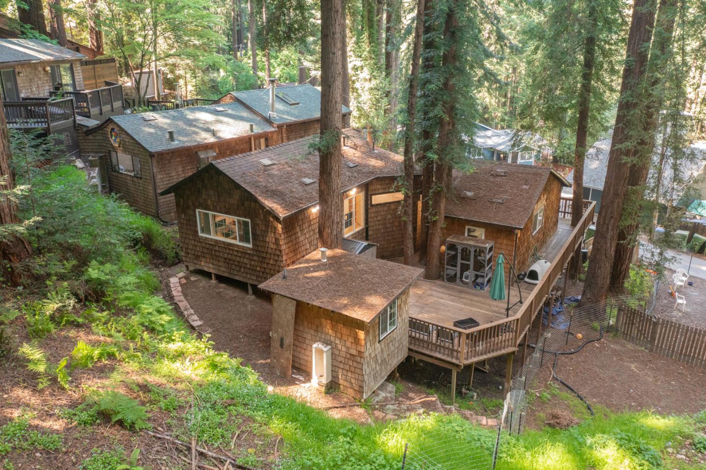 17550 Comanche Trail Los Gatos, CA 95033 - Photo 13 of 15 a view of a chairs and table in the backyard