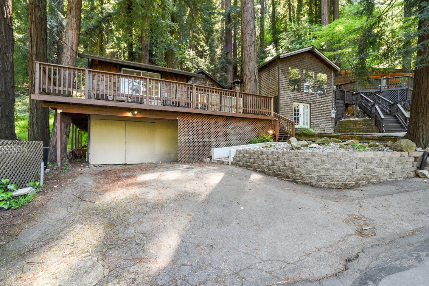 17550 Comanche Trail Los Gatos, CA 95033 - Photo 14 of 15 a house view with a garden space