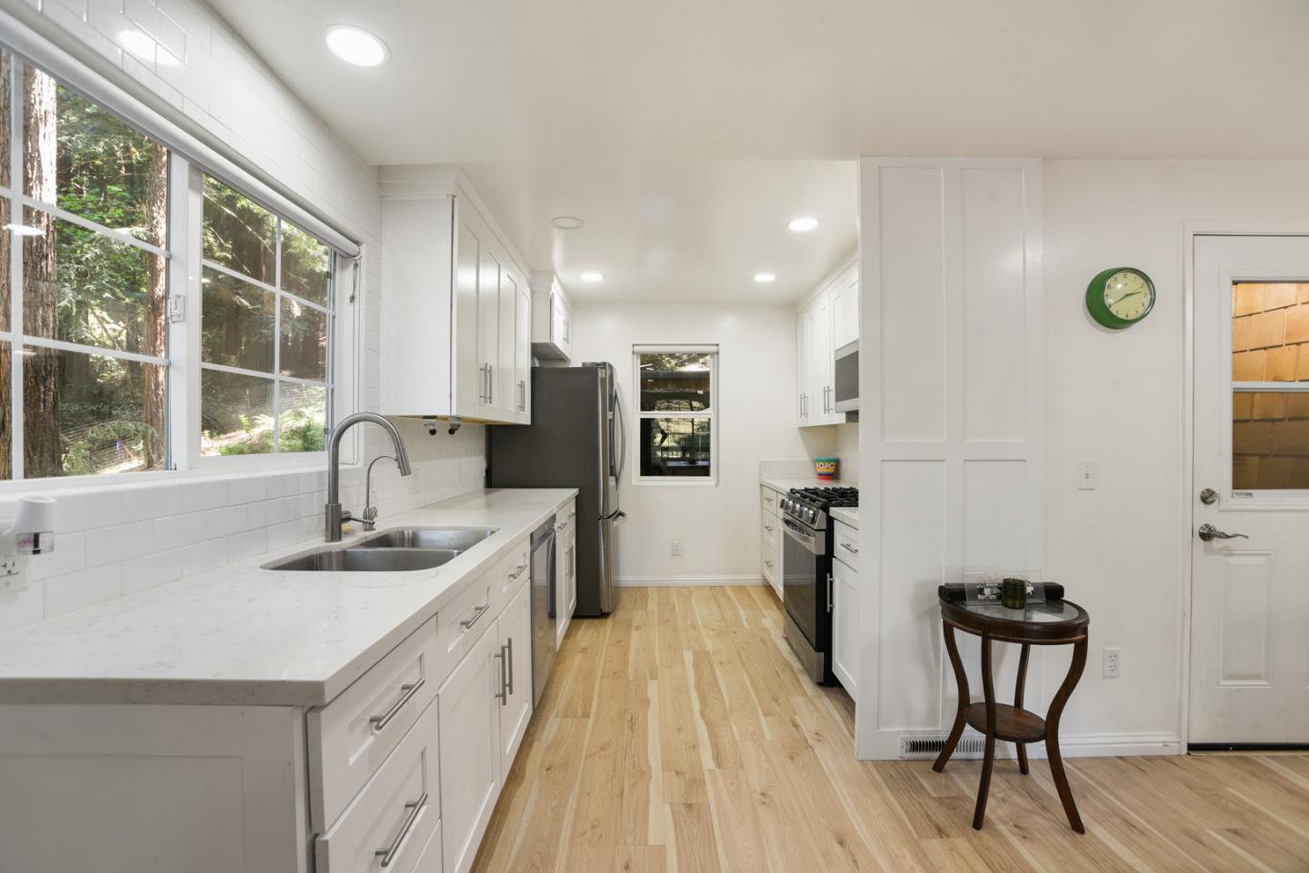 17550 Comanche Trail Los Gatos, CA 95033 - Photo 3 of 15 a kitchen with a sink a refrigerator and wooden floor