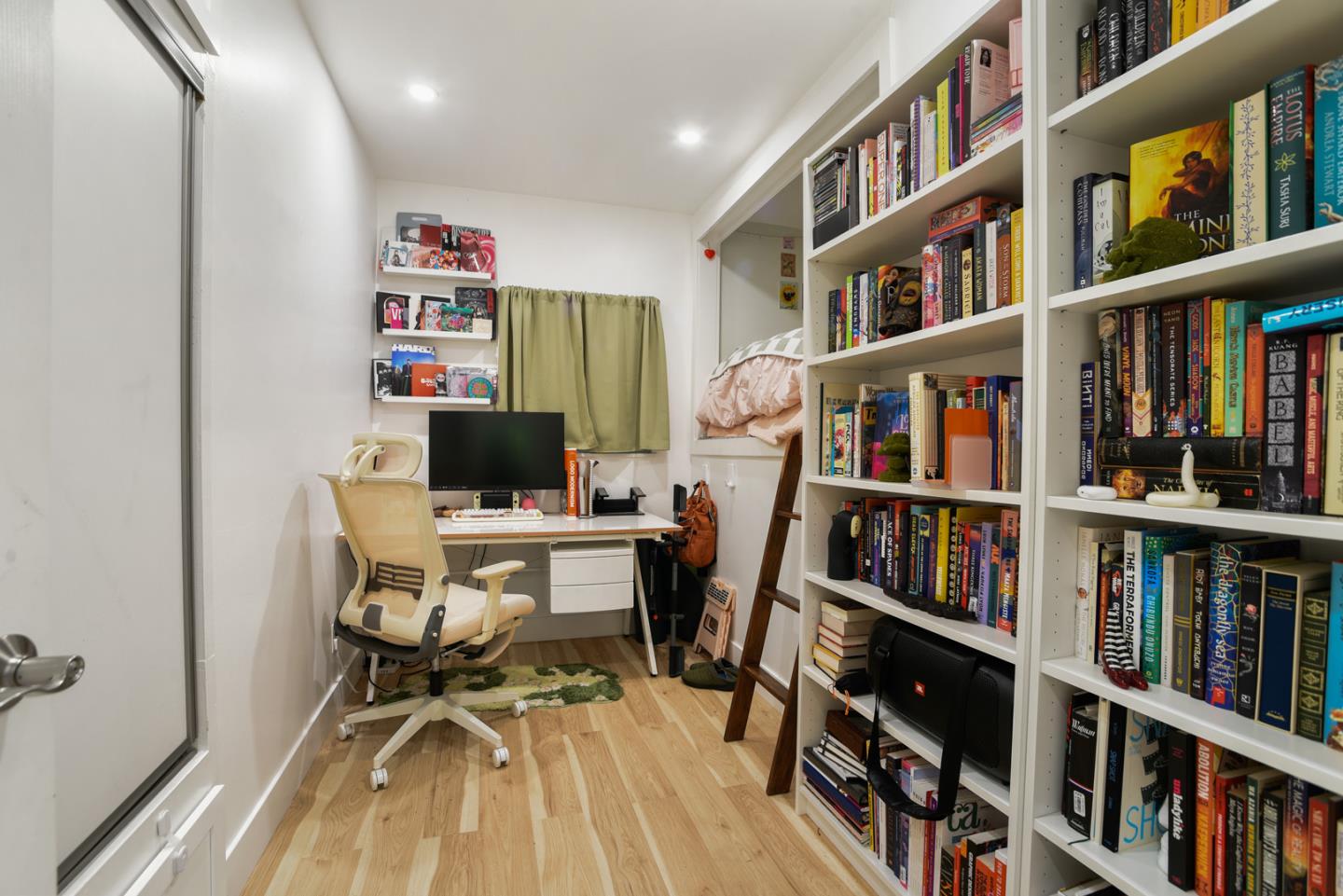 17550 Comanche Trail Los Gatos, CA 95033 - Photo 7 of 15 a view of a workspace with bookshelf