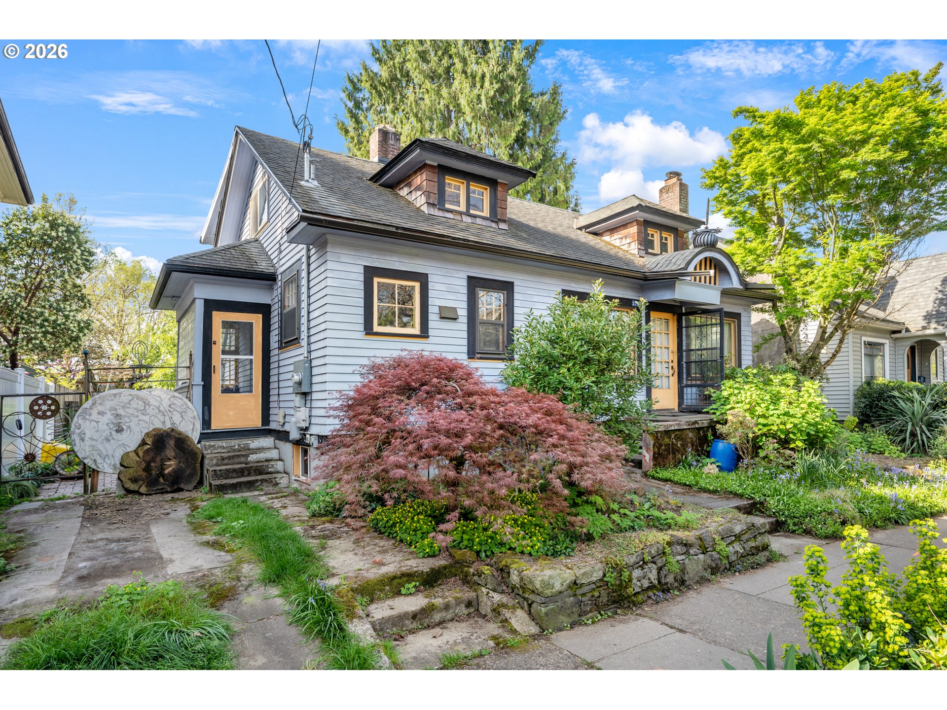 2714 Northeast Everett Street Portland, OR 97232 - Photo 3 of 6 a front view of a house with garden