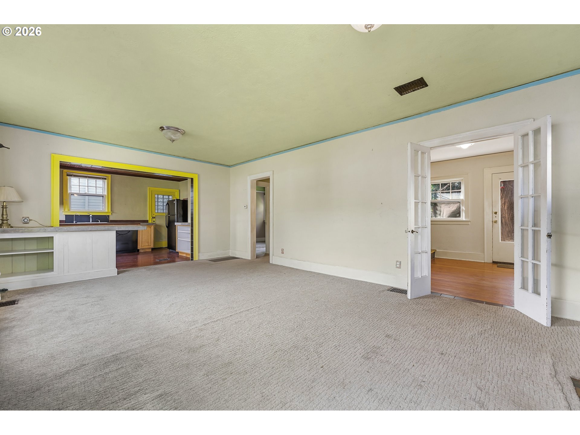 2714 Northeast Everett Street Portland, OR 97232 - Photo 6 of 6 a view of an empty room with window and cabinet