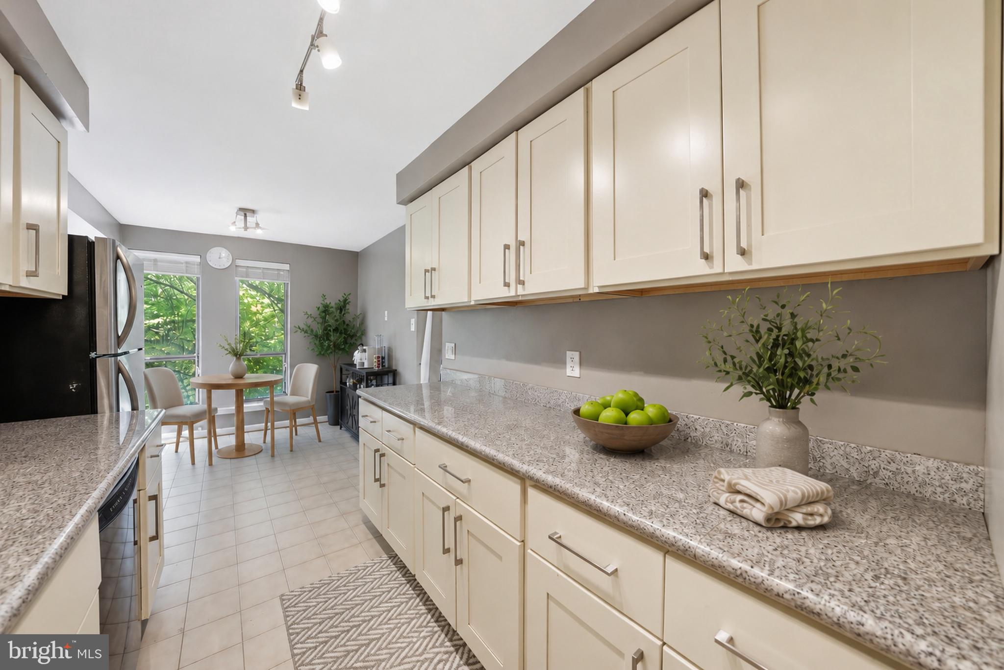 11252 Chestnut Grove Square, Unit 248 Reston, VA 20190 - Photo 8 of 25 Bright and airy kitchen retreat.