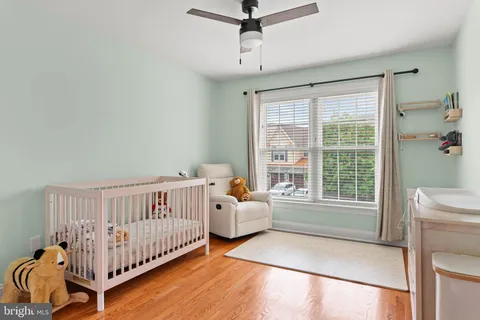 a bedroom with furniture and windows