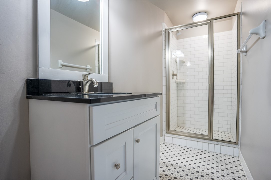 300 Alexander Street, Unit 112 Rochester, NY 14607 - Photo 6 of 12 Primary bathroom with step in shower