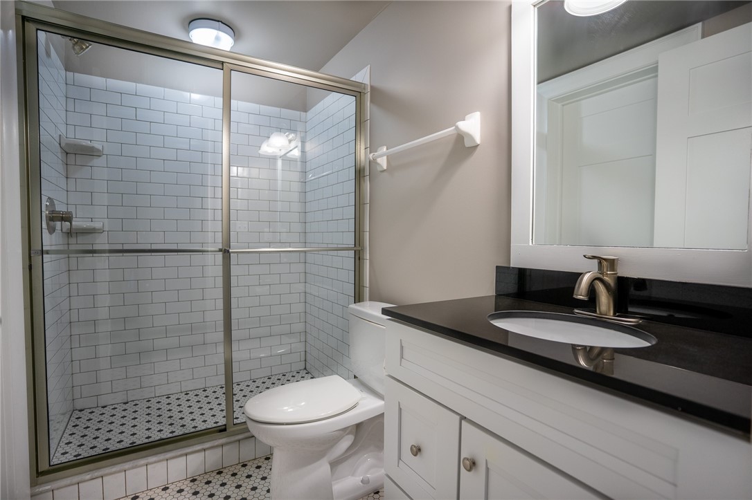 300 Alexander Street, Unit 112 Rochester, NY 14607 - Photo 8 of 12 Second full bathroom with step in shower
