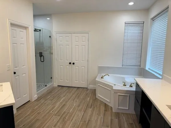a bathroom with a sink and a bathtub