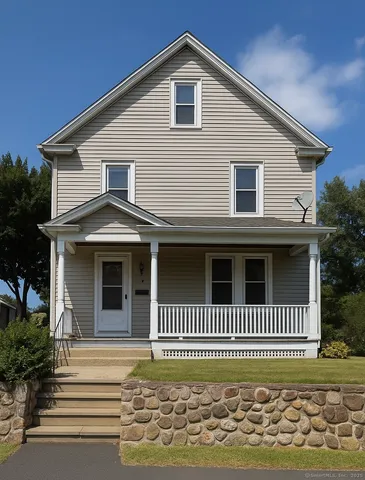 a front view of a house with a porch