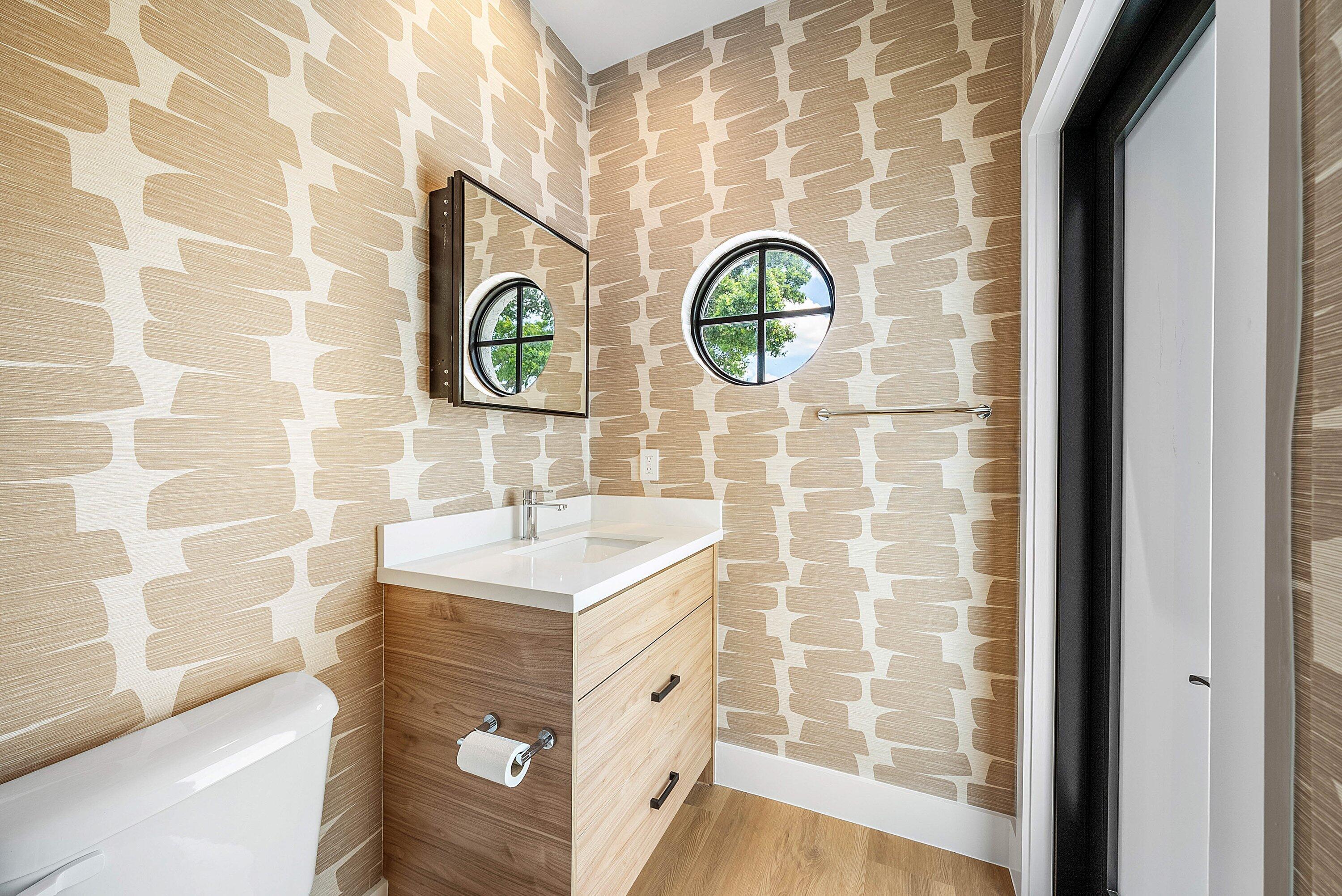 5798 Northwest 21st Avenue Boca Raton, FL 33496 - Photo 16 of 52 a bathroom with a sink and a mirror
