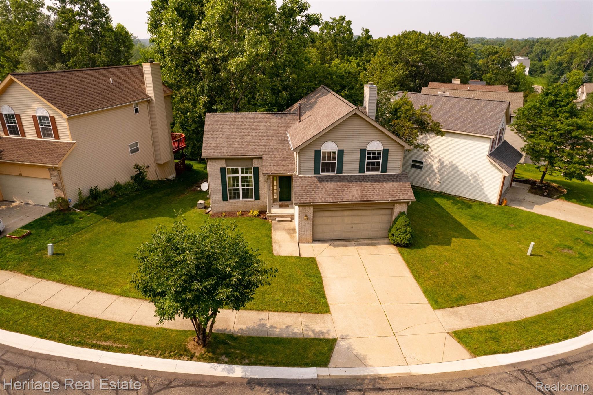 117 Eagle Ridge Road Lake Orion, MI 48360 - Photo 50 of 61 Subdivision is wooded