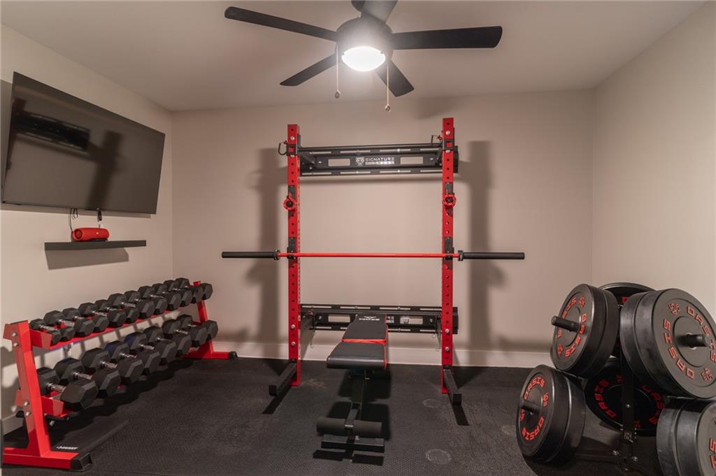 2250 Sperin Road Ball Ground, GA 30107 - Photo 33 of 56 a view of gym equipment with wooden floor