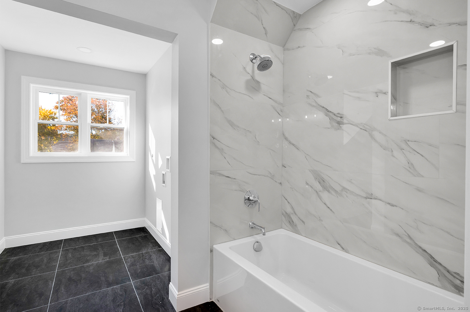 183 Vesper Street Fairfield, CT 06825 - Photo 18 of 21 a bathroom with a bathtub