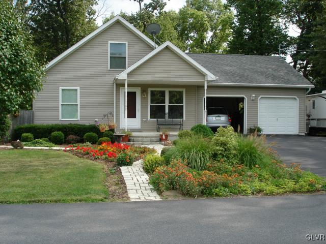 2147 Whitehead Road Nazareth, PA 18064 - Photo 1 of 35 a front view of house with yard and green space