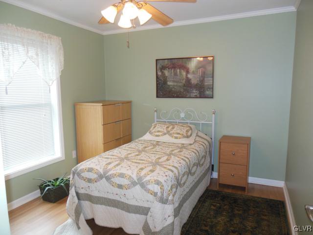 2147 Whitehead Road Nazareth, PA 18064 - Photo 19 of 35 a bedroom with a bed and a lamp on dresser