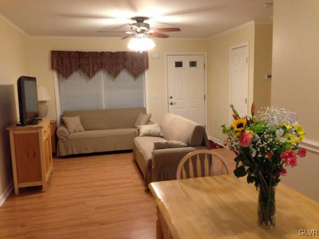 2147 Whitehead Road Nazareth, PA 18064 - Photo 3 of 35 a living room with furniture flowerpot and a chandelier
