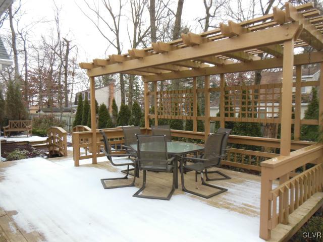2147 Whitehead Road Nazareth, PA 18064 - Photo 31 of 35 a view of a patio with a table and chairs and floor to ceiling window