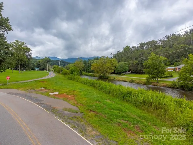 a view of a golf course with a lake