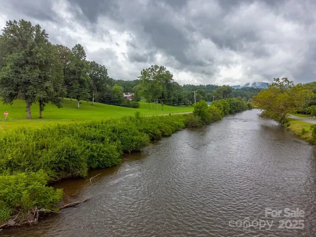 a view of a lake with mountains in the background