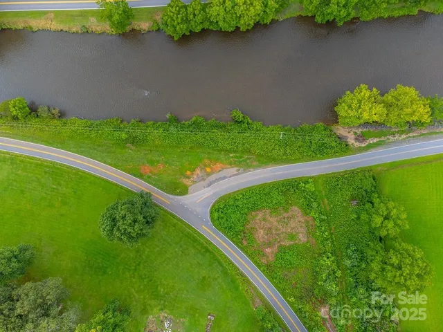 a view of a garden with a lake