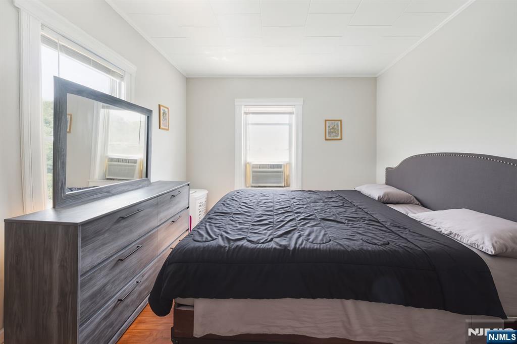 309 Lookout Avenue Hackensack, NJ 07601 - Photo 13 of 25 a bedroom with a bed and a window