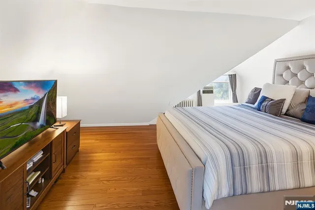 a bed room with a bed and a couch