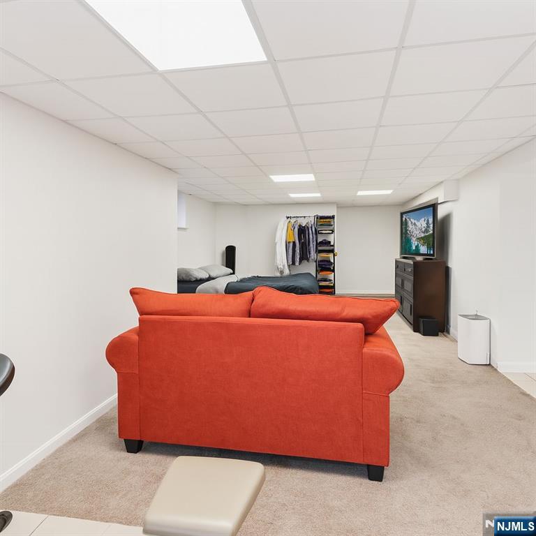 309 Lookout Avenue Hackensack, NJ 07601 - Photo 17 of 25 a bed room with a bed and a couch