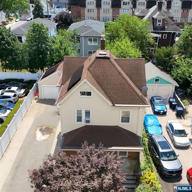 309 Lookout Avenue Hackensack, NJ 07601 - Photo 2 of 25 a aerial view of a house with a yard and balcony