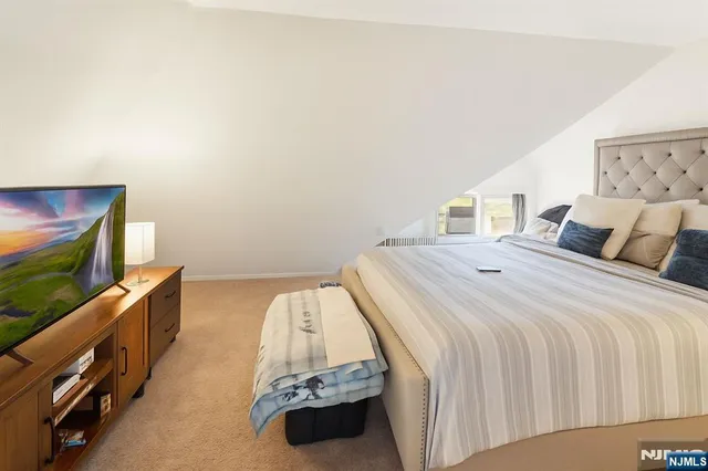 a view of a bathroom from a hallway