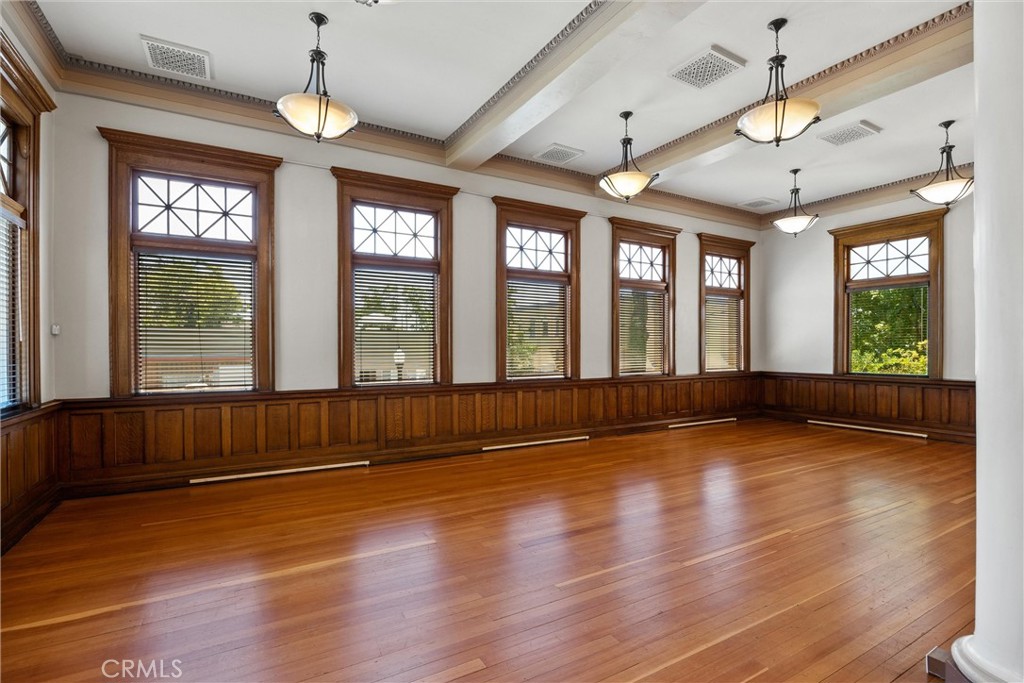 909 Jefferson Street Red Bluff, CA 96080 - Photo 12 of 41 a view of empty room with wooden floor and fan