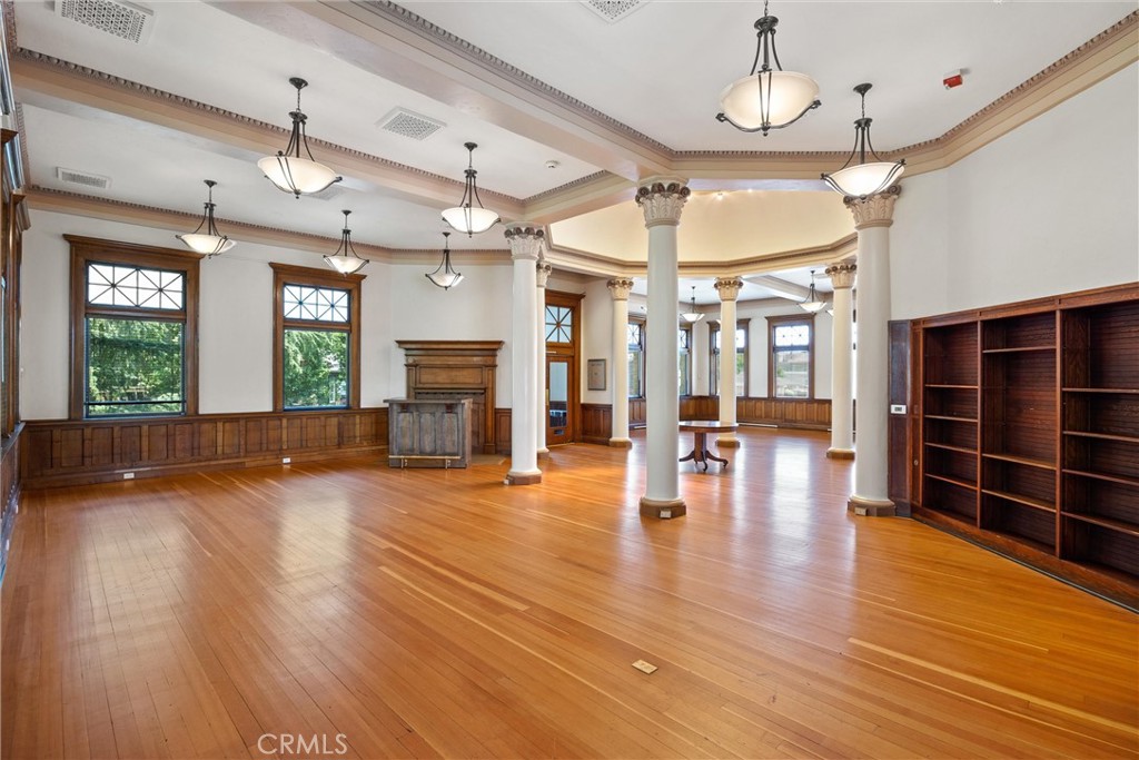 909 Jefferson Street Red Bluff, CA 96080 - Photo 13 of 41 a view of an empty room with wooden floor and a window