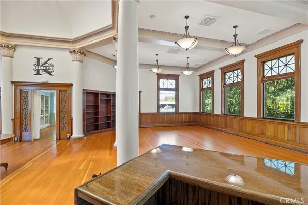 a view of front door with wooden floor