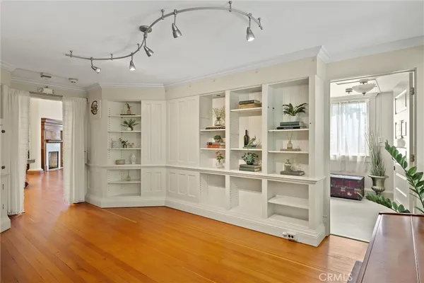 a front view of a house with wooden floor