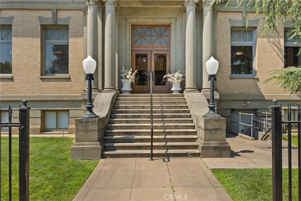 909 Jefferson Street Red Bluff, CA 96080 - Photo 2 of 41 a view of a house with a chairs and a table in patio
