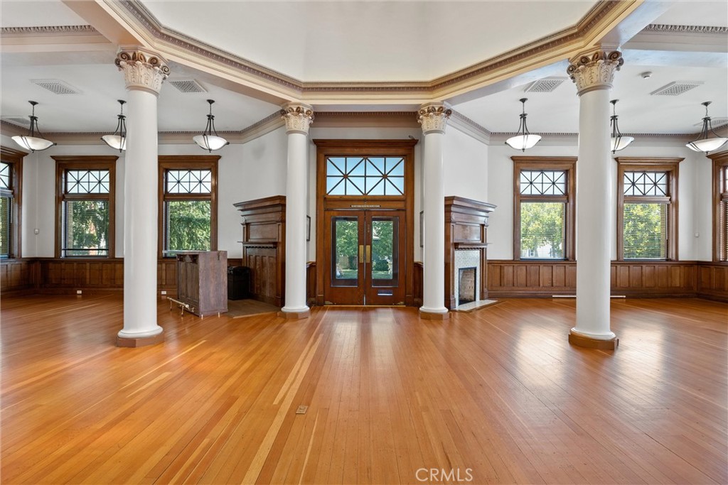 909 Jefferson Street Red Bluff, CA 96080 - Photo 4 of 41 a view of an entryway with wooden floor and windows