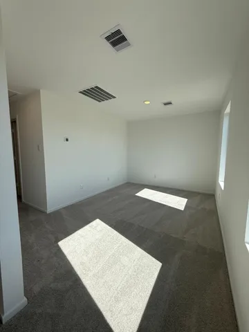 an empty room with an entryway