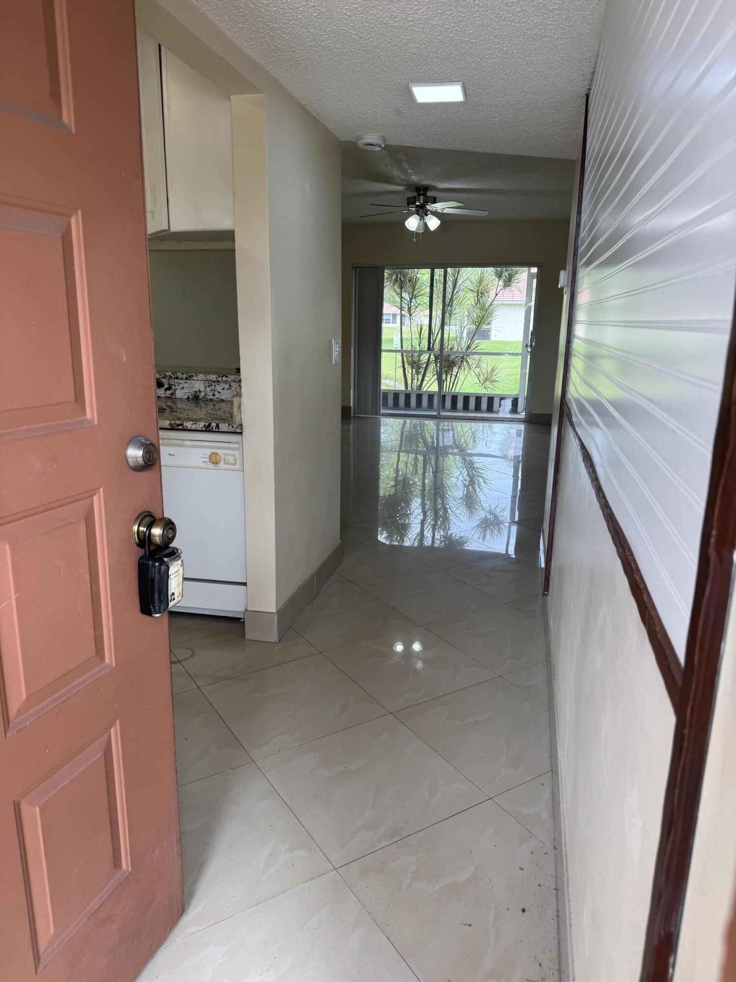 9921 Three Lakes Circle, Unit 9921 Boca Raton, FL 33428 - Photo 4 of 46 IMG_2878