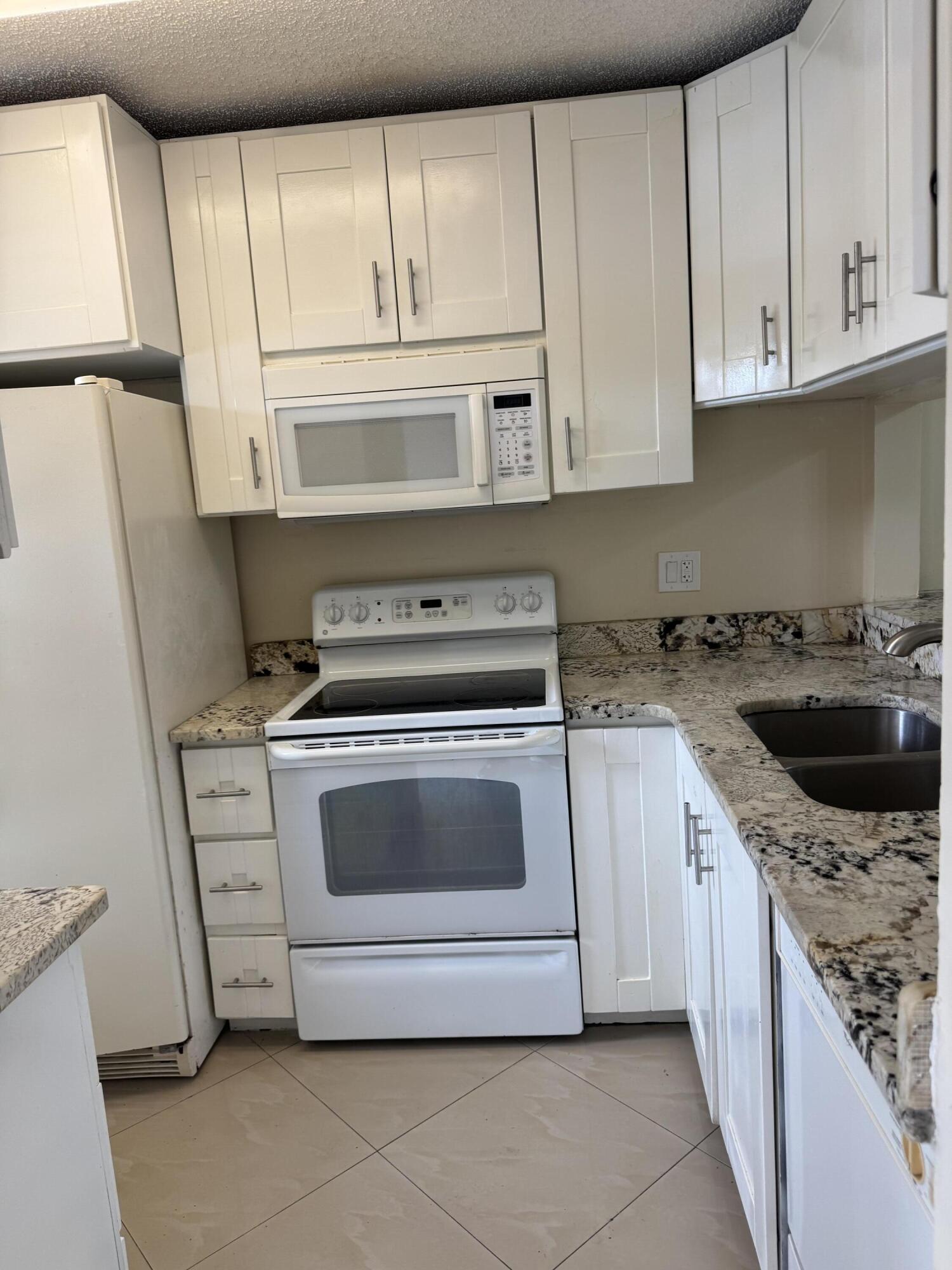 9921 Three Lakes Circle, Unit 9921 Boca Raton, FL 33428 - Photo 5 of 46 IMG_2830