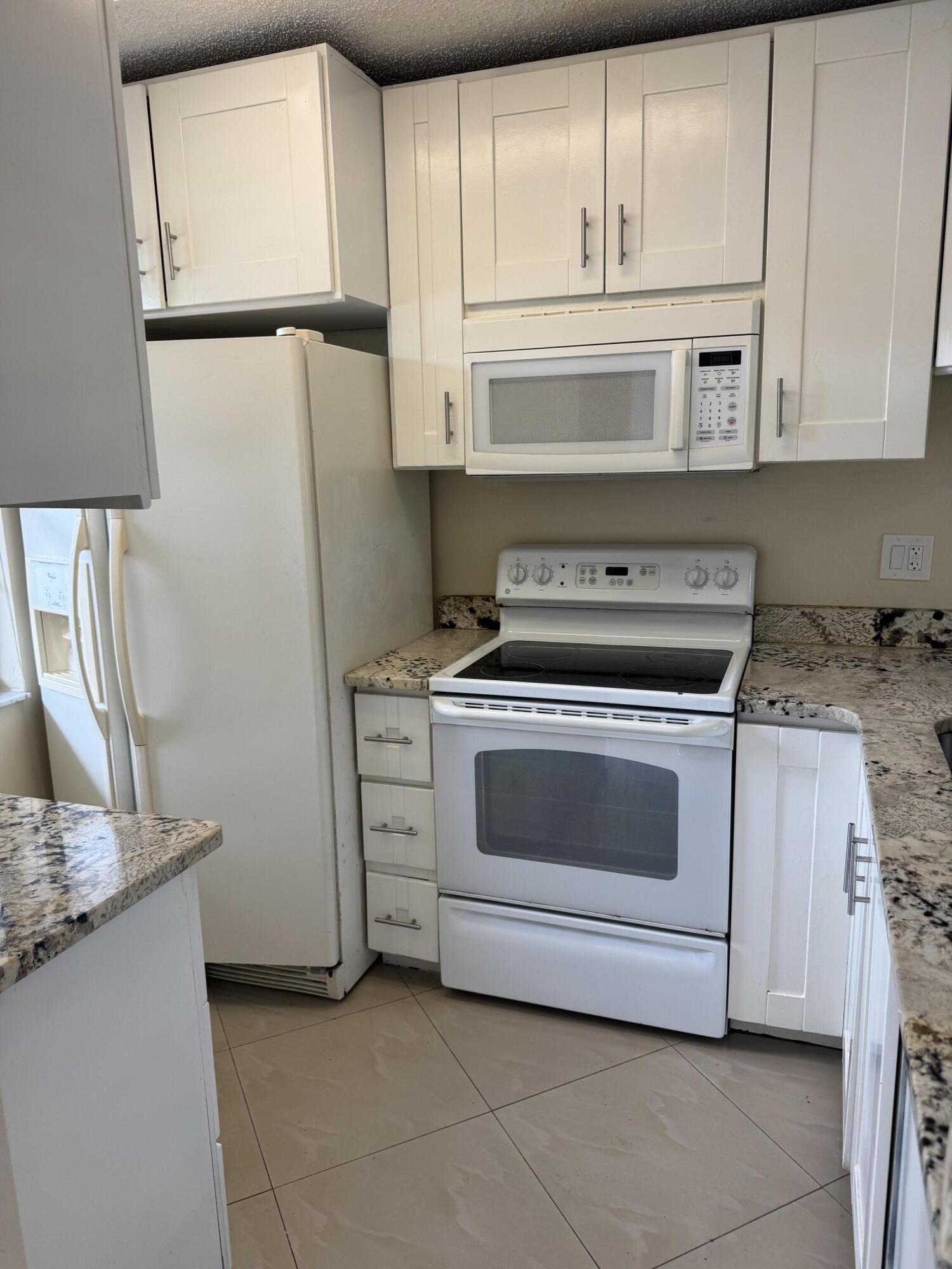 9921 Three Lakes Circle, Unit 9921 Boca Raton, FL 33428 - Photo 6 of 46 IMG_2831