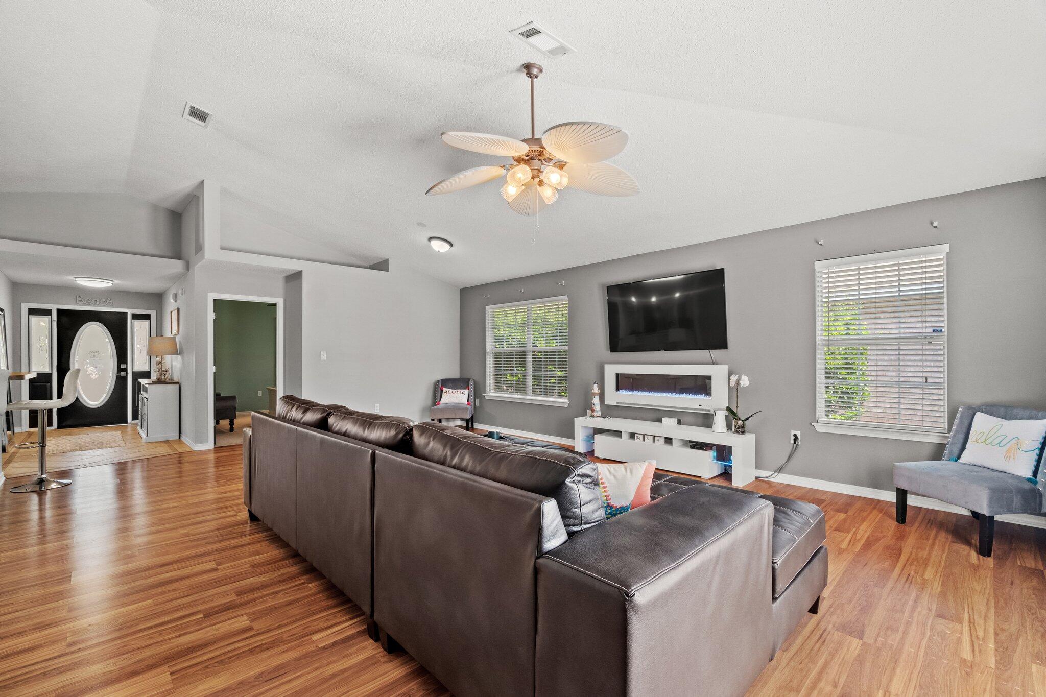 125 Bayou Landing Road Miramar Beach, FL 32550 - Photo 11 of 21 a living room with furniture and a flat screen tv