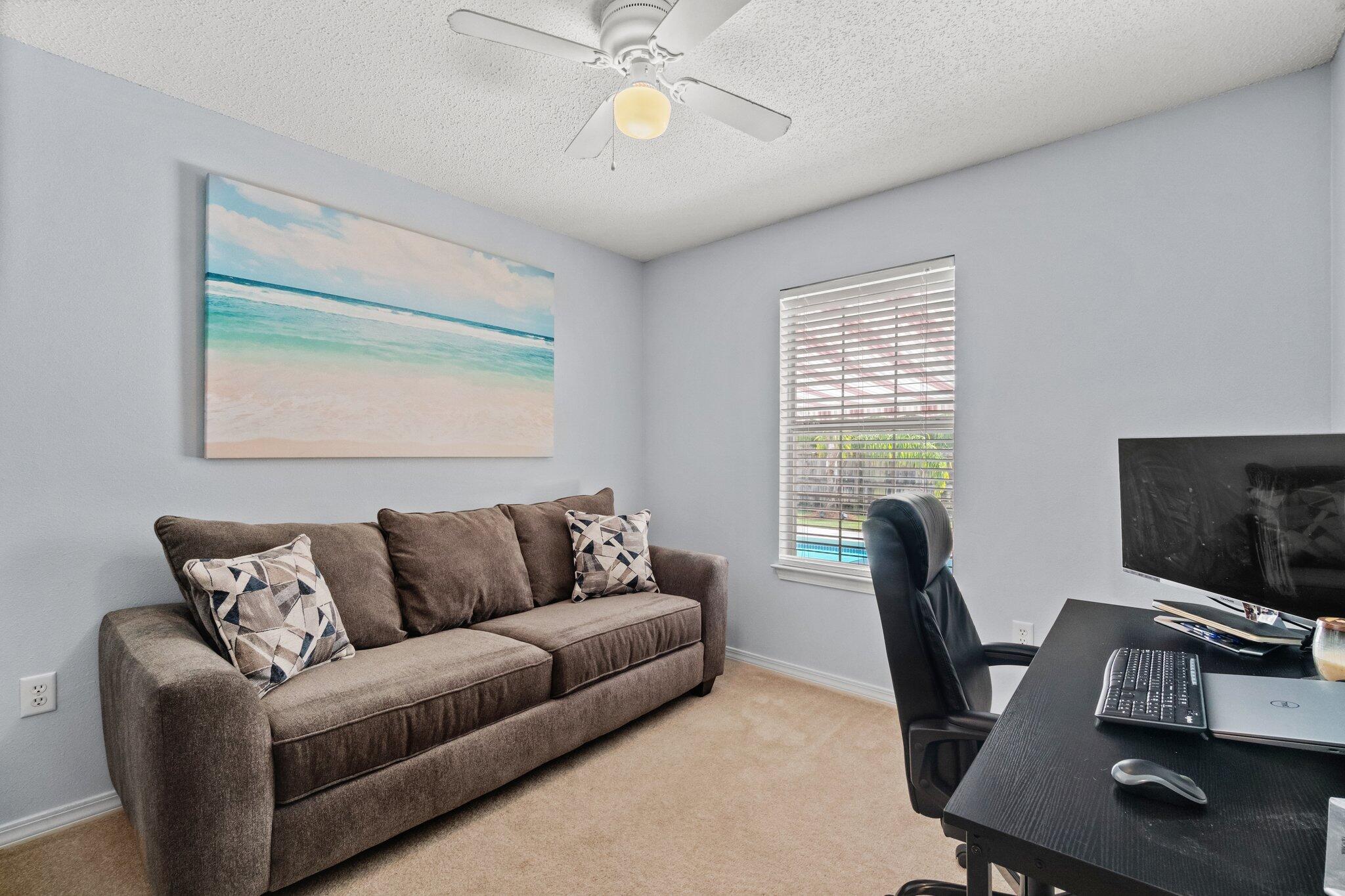 125 Bayou Landing Road Miramar Beach, FL 32550 - Photo 15 of 21 a living room with furniture and a flat screen tv