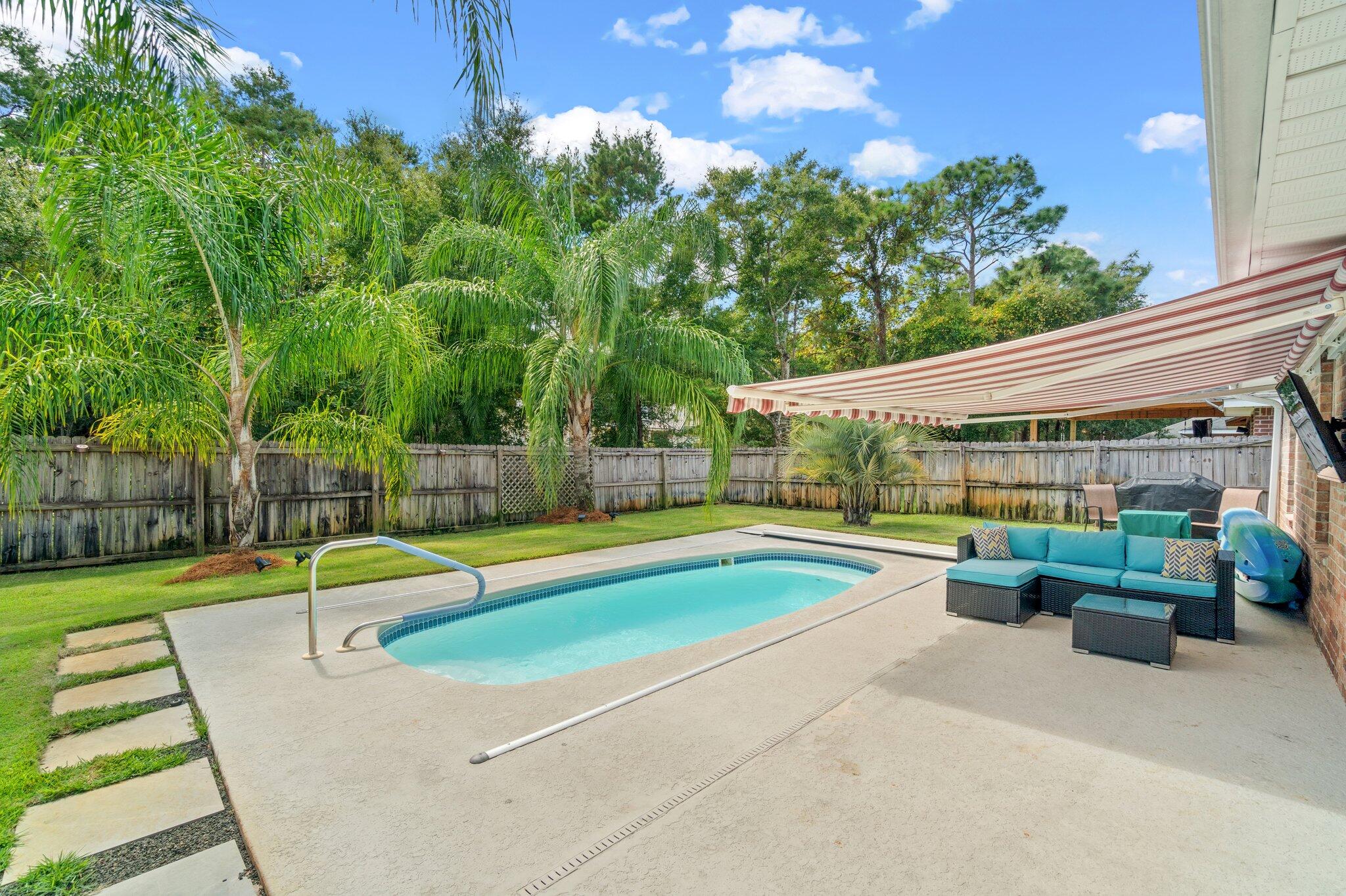 125 Bayou Landing Road Miramar Beach, FL 32550 - Photo 19 of 21 a view of a swimming pool with a patio