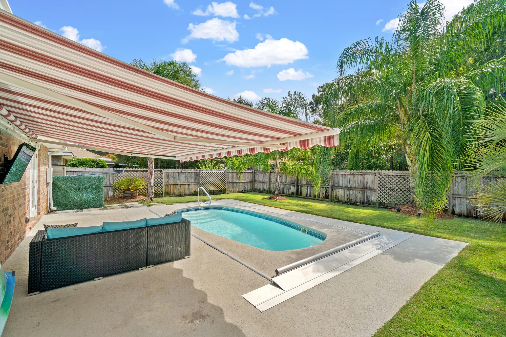 125 Bayou Landing Road Miramar Beach, FL 32550 - Photo 20 of 21 a view of a backyard with a swimming pool