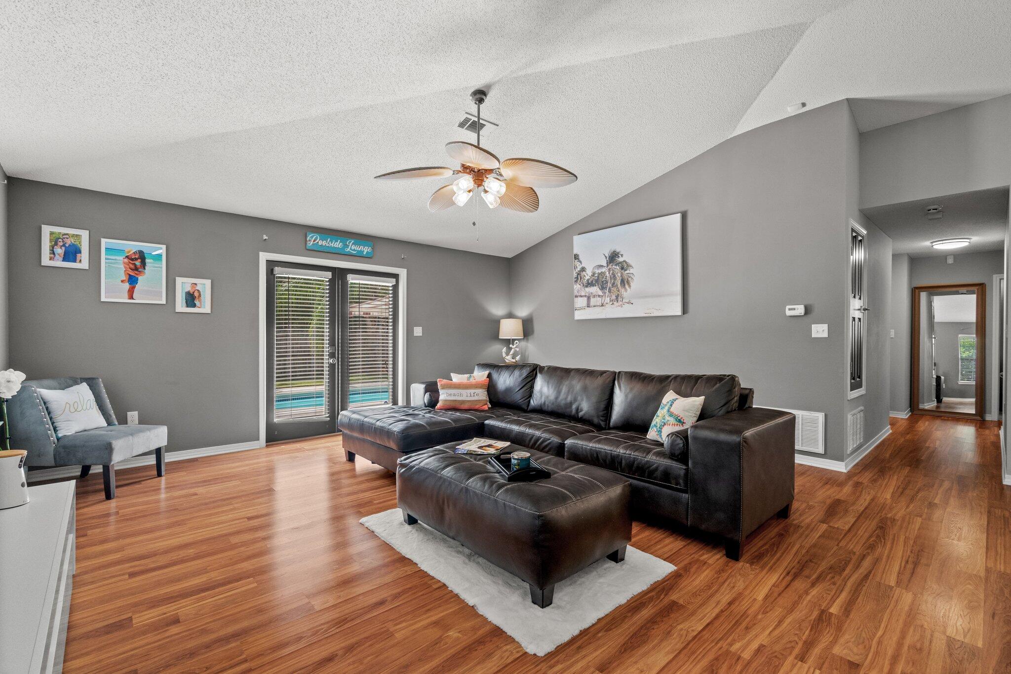 125 Bayou Landing Road Miramar Beach, FL 32550 - Photo 8 of 21 a living room with furniture and a wooden floor