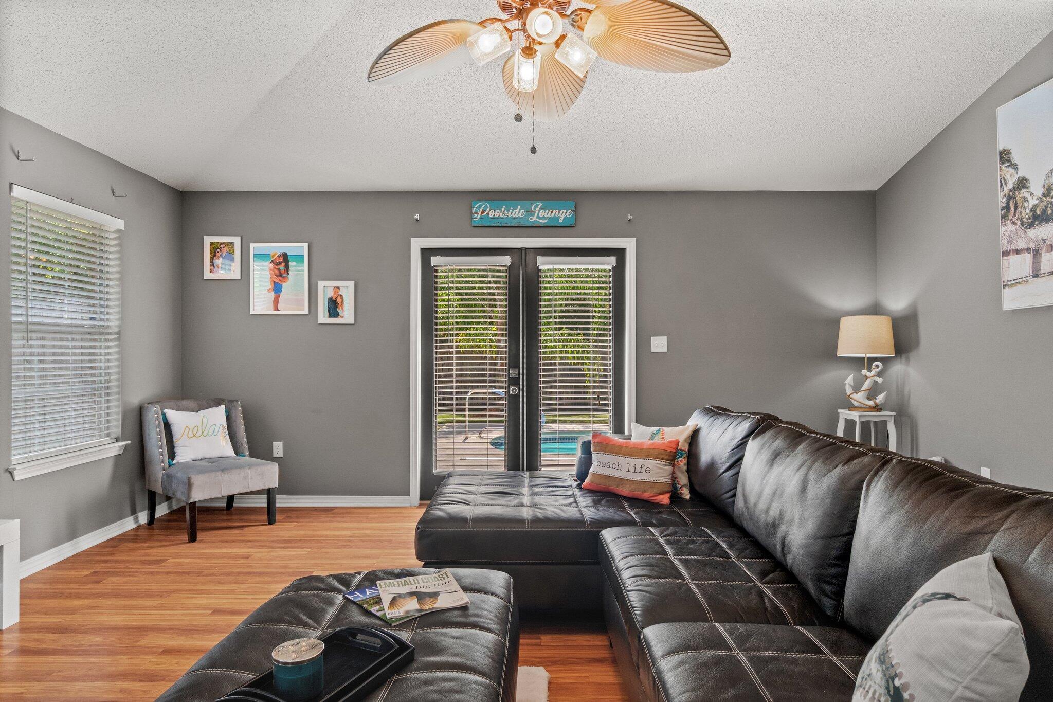 125 Bayou Landing Road Miramar Beach, FL 32550 - Photo 9 of 21 a living room with furniture and a chandelier