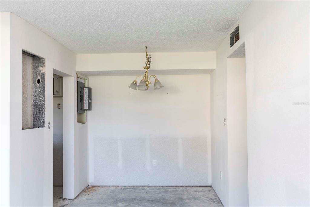 4715 Jasper Drive, Unit 107 New Port Richey, FL 34652 - Photo 6 of 22 a view of a hallway with closet