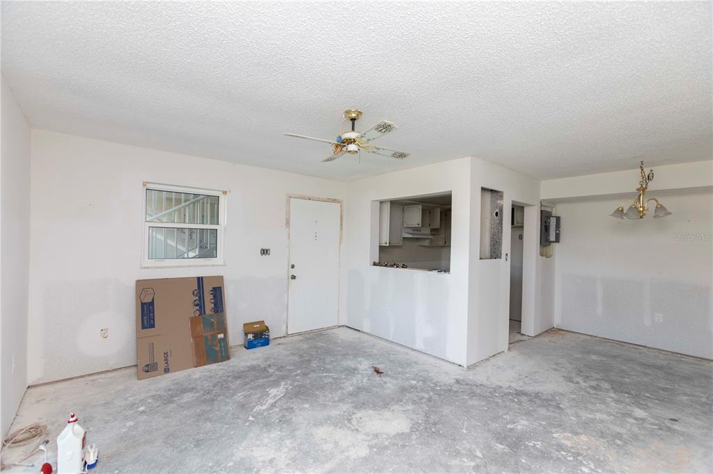 4715 Jasper Drive, Unit 107 New Port Richey, FL 34652 - Photo 10 of 22 a view of a big room with closet and windows
