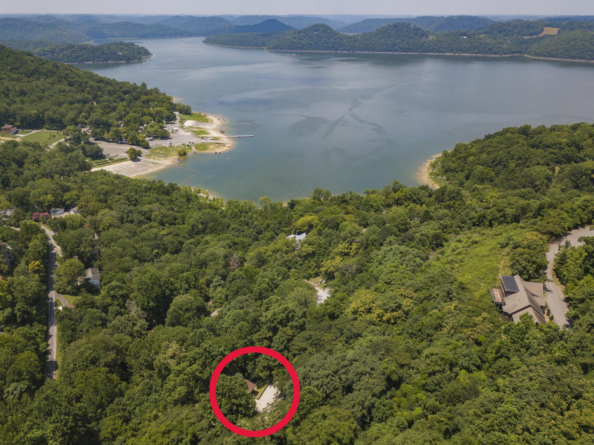 573 Floating Mill Village Road Silver Point, TN 38582 - Photo 28 of 30 a aerial view of a house with a yard and lake view