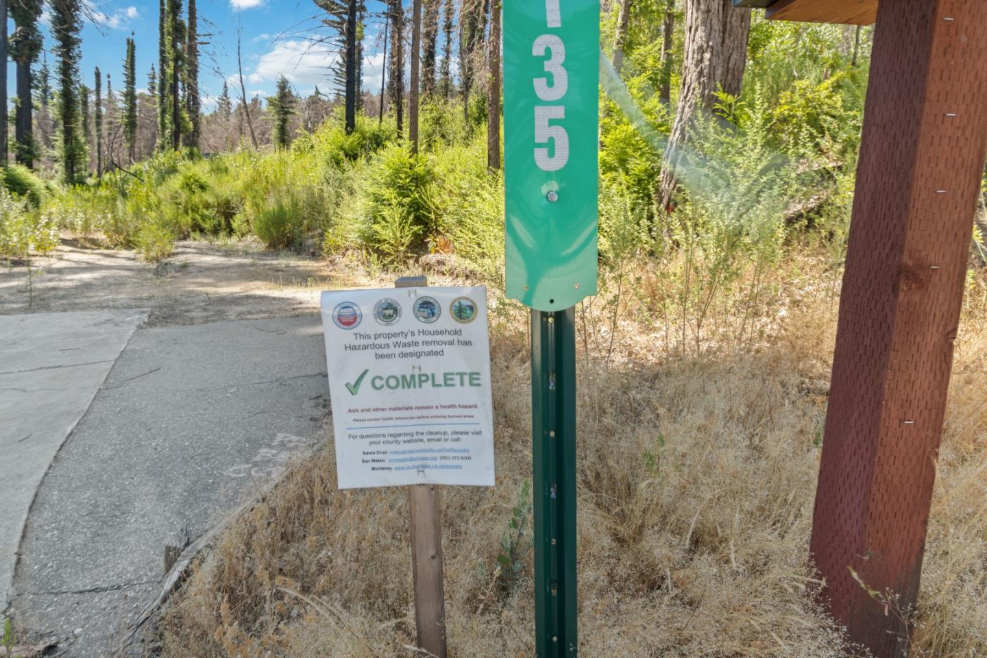 135 Fallen Leaf Drive Boulder Creek, CA 95006 - Photo 8 of 28 a sign that is on the side of a building