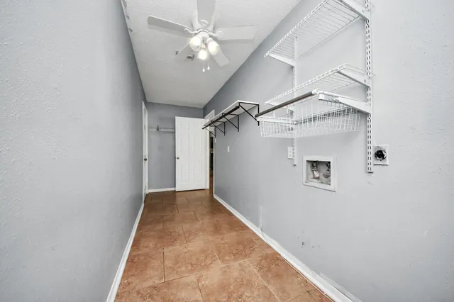 a bathroom with a sink mirror and toilet